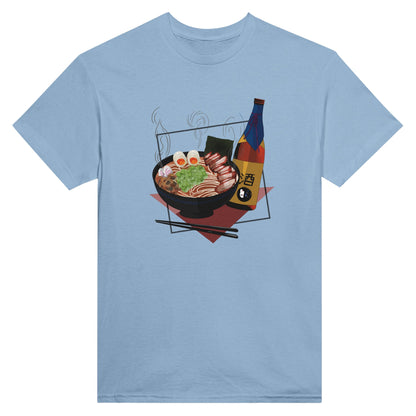 Light blue t-shirt featuring a print of a steaming bowl of ramen with eggs, seaweed, and slices of meat, accompanied by a bottle of sake and chopsticks, set on a red geometric background.