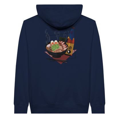  Navy premium hoodie featuring a print of a steaming bowl of ramen with eggs, seaweed, and slices of meat, accompanied by a bottle of sake and chopsticks, set on a red geometric background.